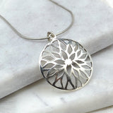 Flower Burst Silver Pendant Earrings Dambar International 